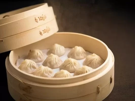Xiao Long Bao in a bamboo steamer
