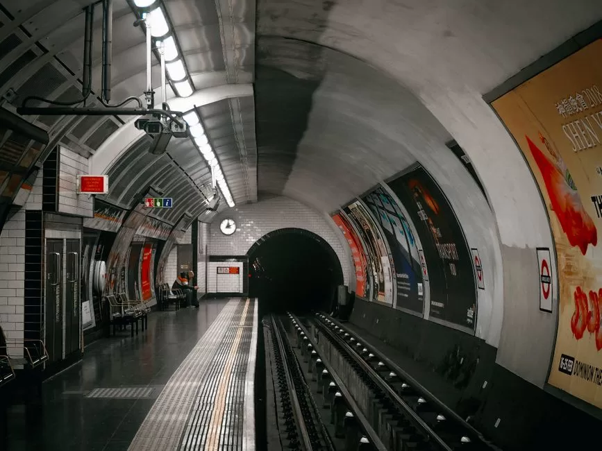 A tube train arriving at a platform