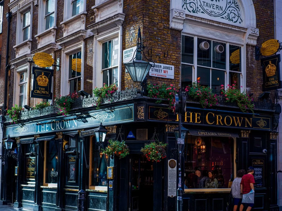 A London pub lit up at night