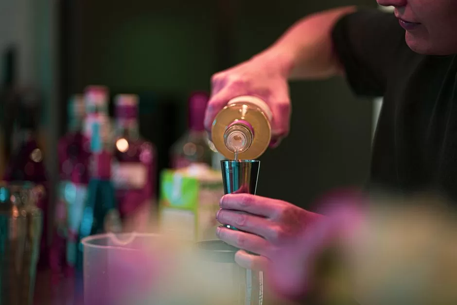 A bartender making a cocktail
