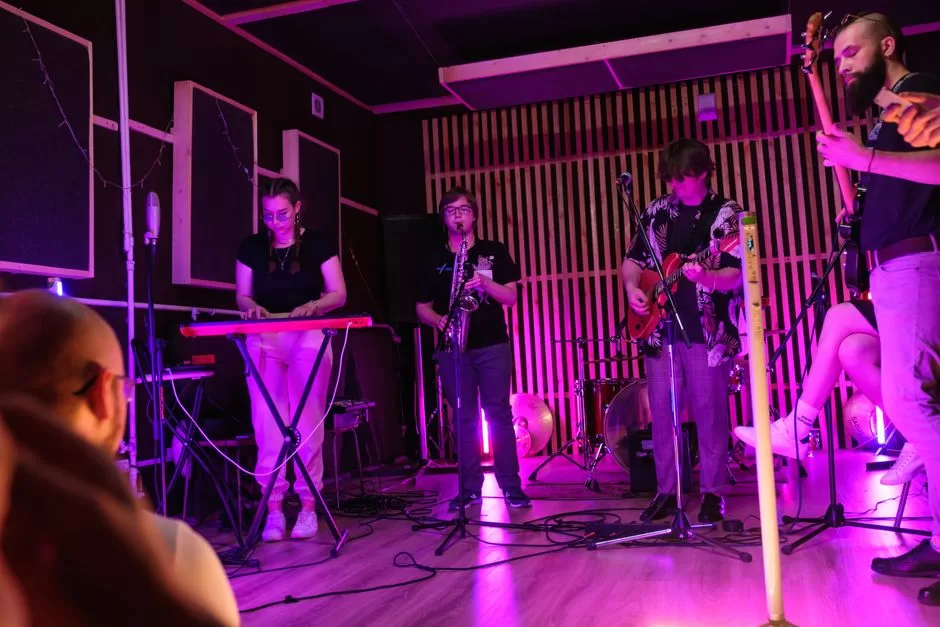 A band playing in a small venue