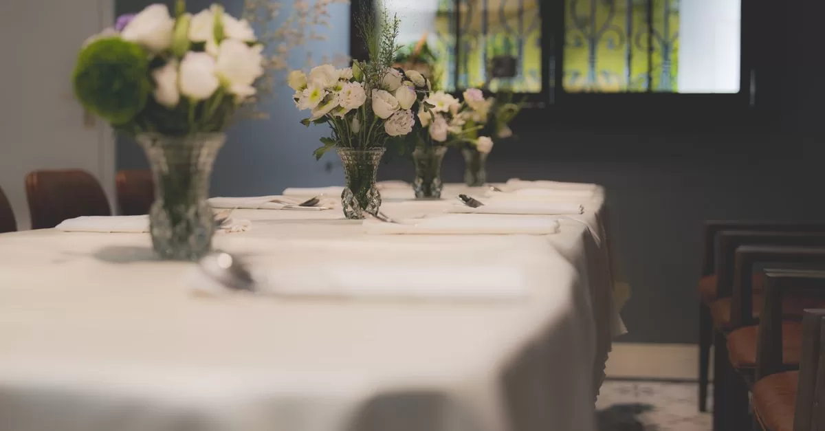 A laid table in a restaurant dining room